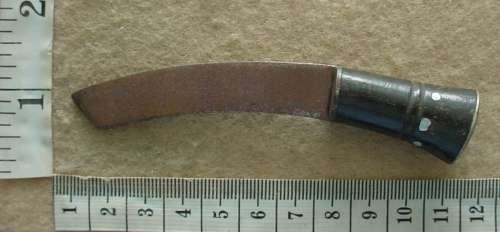 Gurkha kukri or khukuri knife, one of two small knives that go in back of the scabbard, bone handle