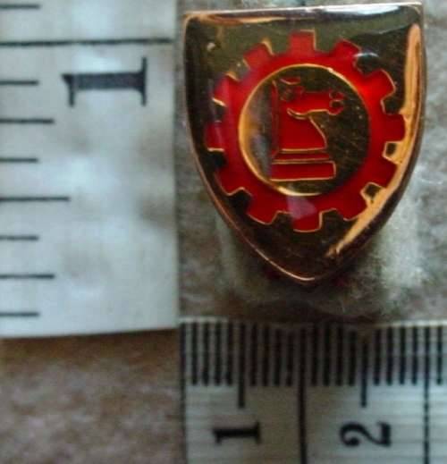South African Army Battle School Maintenance Unit cravat badge, pins intact, right facing