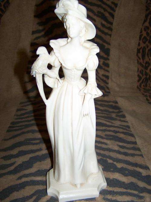 VINTAGE LADY HOLDING PAROT FIGURINE 32CM HIGH