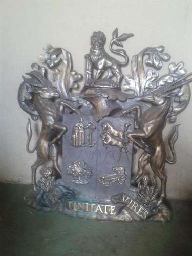 1910 Ex Unitate Vires Coat of arms