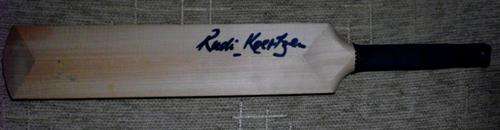 SMALL WOODEN CRICKET BAT SIGNED BY RUDI KOERTZEN