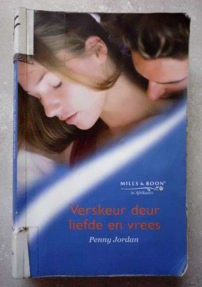Mills and Boon in Afrikaans - Verskeur deur liefde en vrees - Penny Jordan