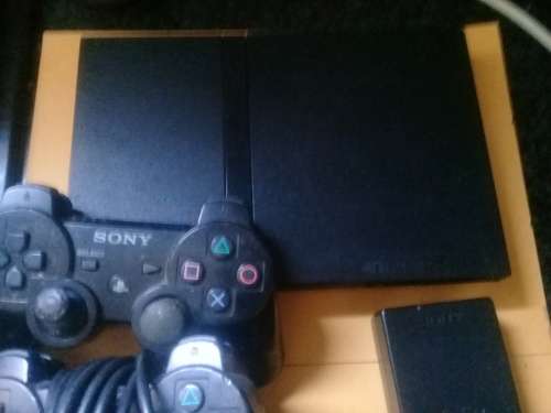 PS2 Console with 2 remotes ( Not Working) For spares or Repairs!!