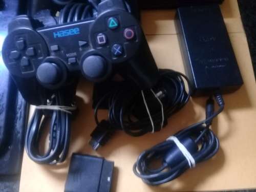 PS2 Console with 2 remotes ( Not Working) For spares or Repairs!!