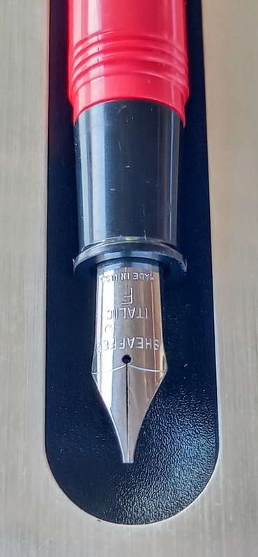 Red and Silver Sheaffer Fountain Pen with 2 extra Nibs and 5 Refills