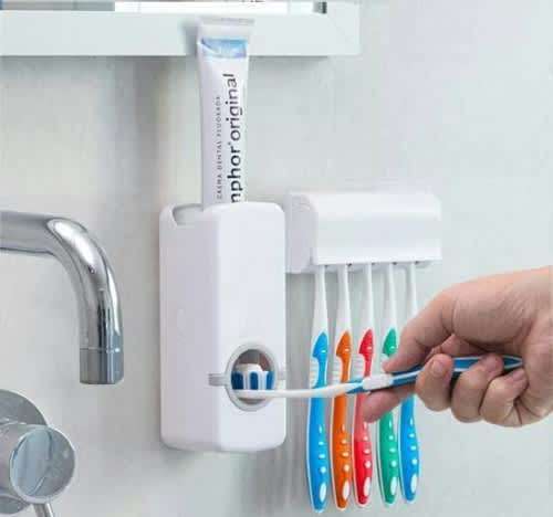 Toothpaste dispenser and toothbrush holder