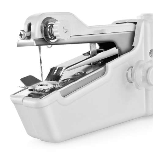Hand held sewing machine