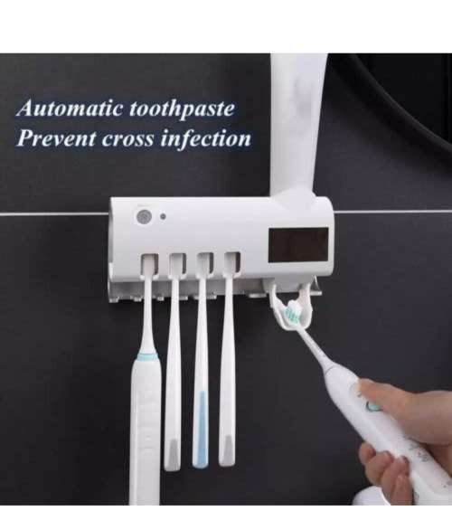 Sterilizing toothbrush holder and toothpaste dispensers