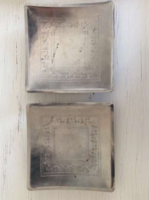 2 silver plated trivets