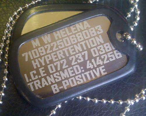 **Set Army style stainless steel dog tags including personalized engraving.**