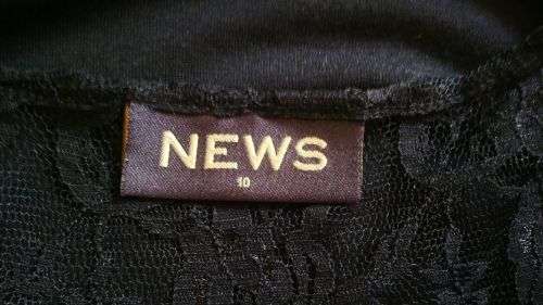Black Top with Lace detail by News Size 10