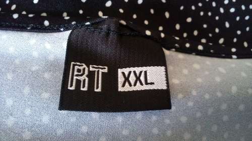 Black and white polkadot Top by RT size XL