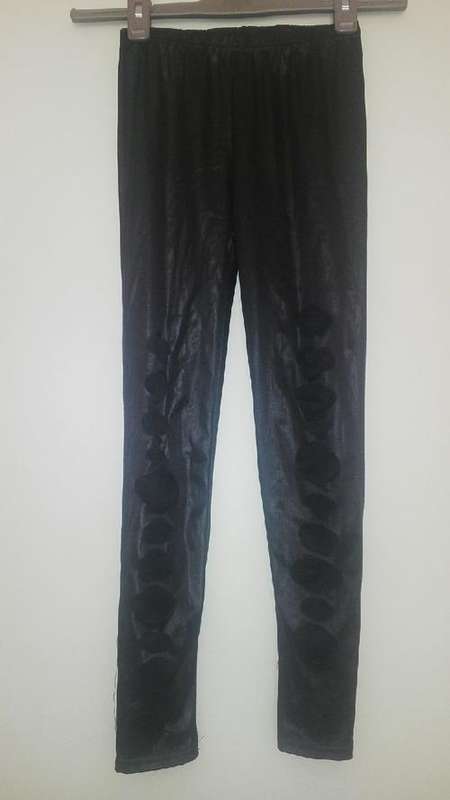 Black leather look leggings with circle cutouts revealing black mesh size small