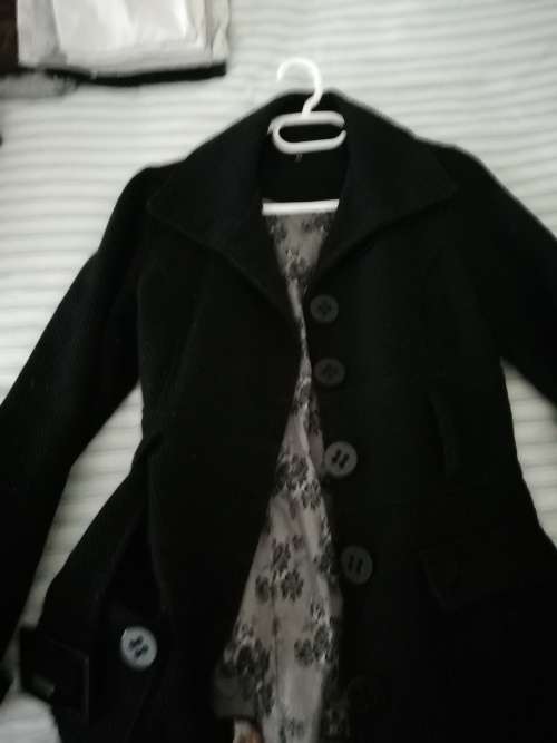 Ladies Black Truworths coat with Damask print on the inside size Medium
