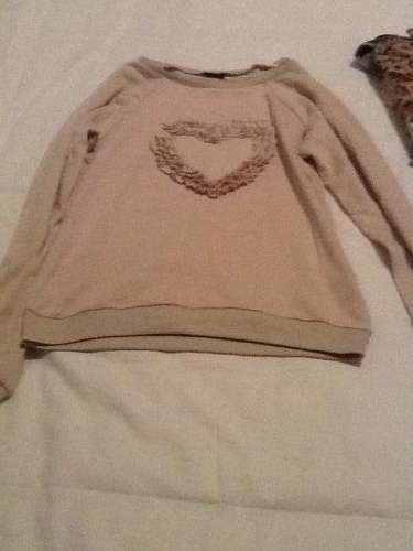 Pretty vintage cream top with heart design size small