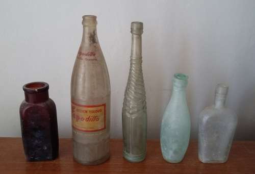 Assorted antique bottles