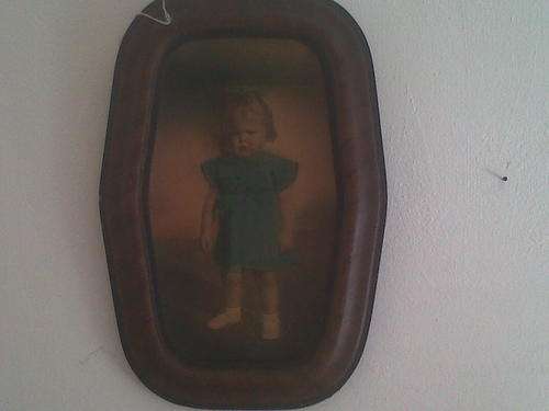 VERY OLD WOODEN FRAME WITH OLEOGRAPH OF LITTLE GIRL.