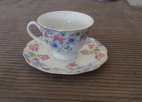 TEA CUP AND SAUCER