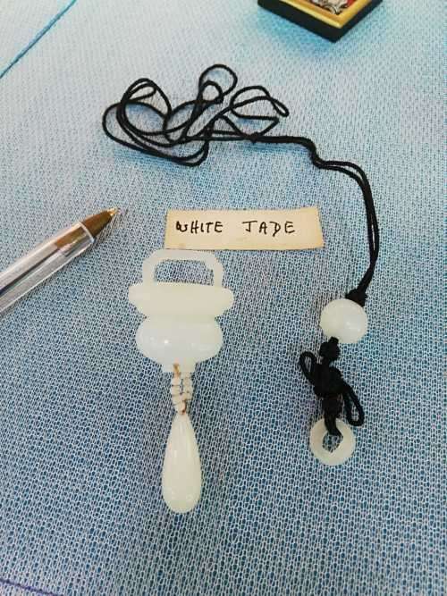 Antique white Jade `comforter` Pendant with beads and ring piece(est:18th to early 20th century)