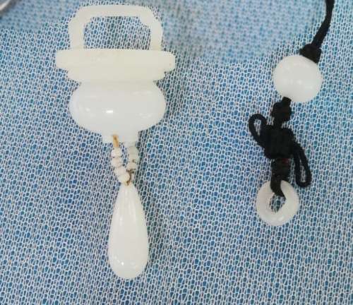 Antique white Jade `comforter` Pendant with beads and ring piece(est:18th to early 20th century)