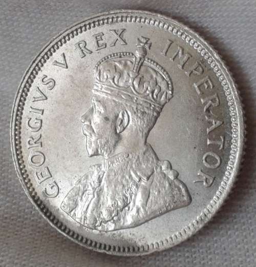 High grade 1932 union silver shilling in lustrous AU