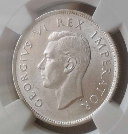Almost mint state 1941 union silver 2 Shillings NGC AU58