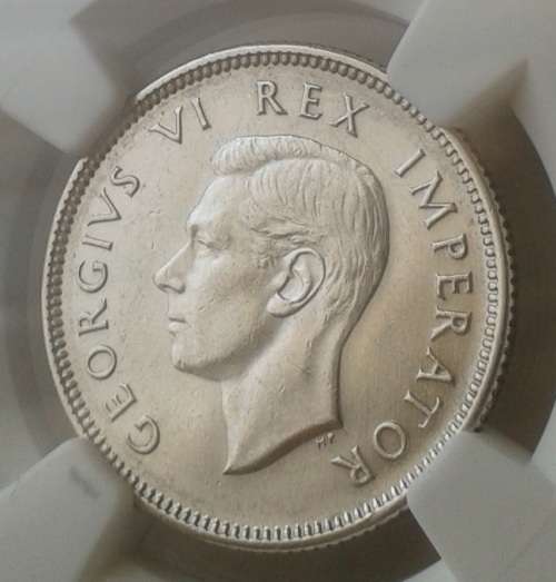 Lustrous 1938 union silver shilling NGC AU55