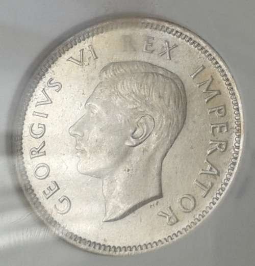 1941 Union silver shilling NGC AU58 (Bakewell Collection)