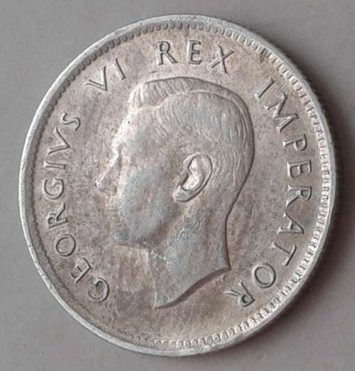 Higher grade 1943 union silver sixpence in XF+