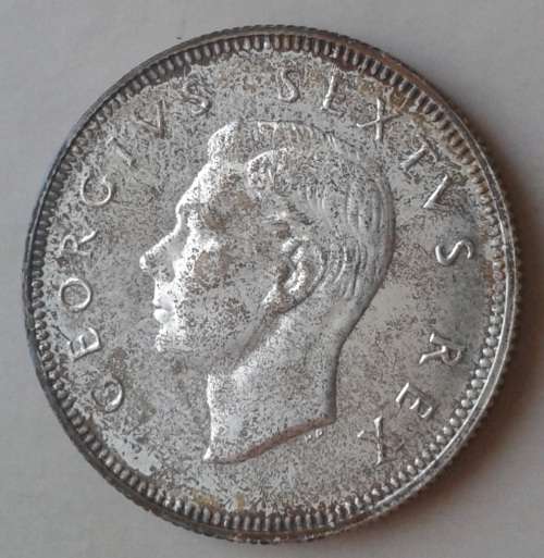 Toned 1952 union proof silver 2 Shillings