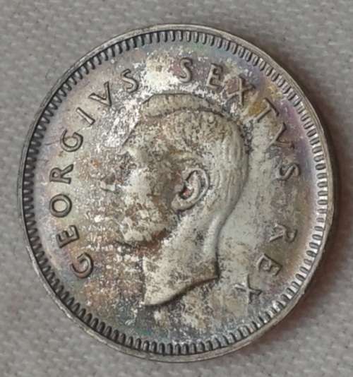 Toned 1952 union proof silver tickey
