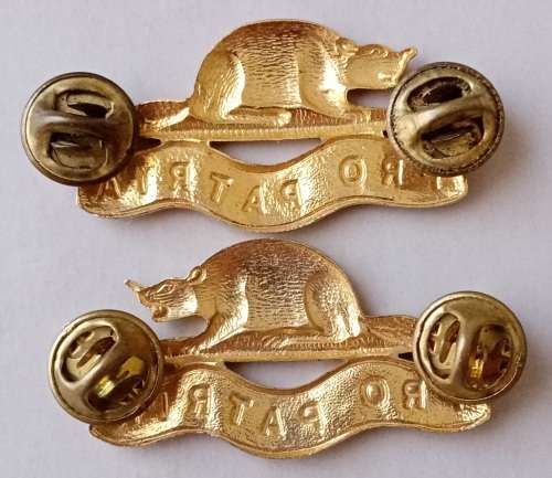 Royal Canadian Regiment officers collar badge pair