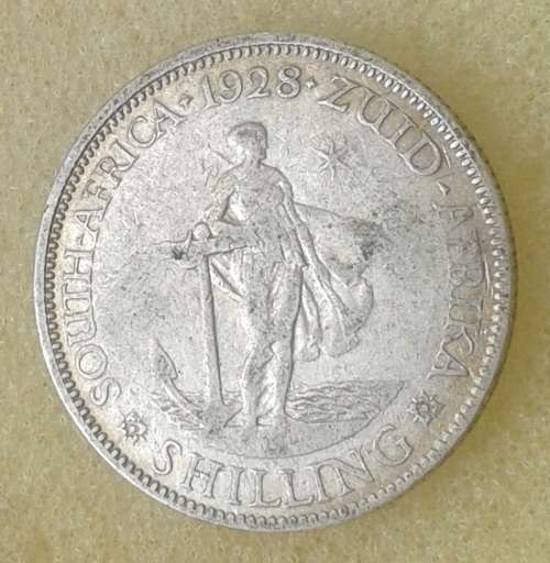 Scarcer 1928 union silver shilling.