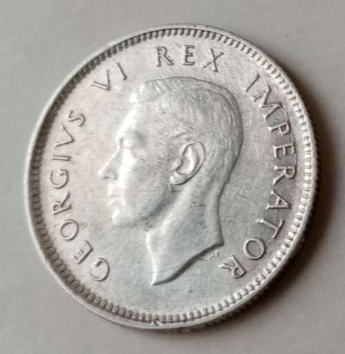 Scarce 1944 union silver sixpence in XF with obverse die cracks