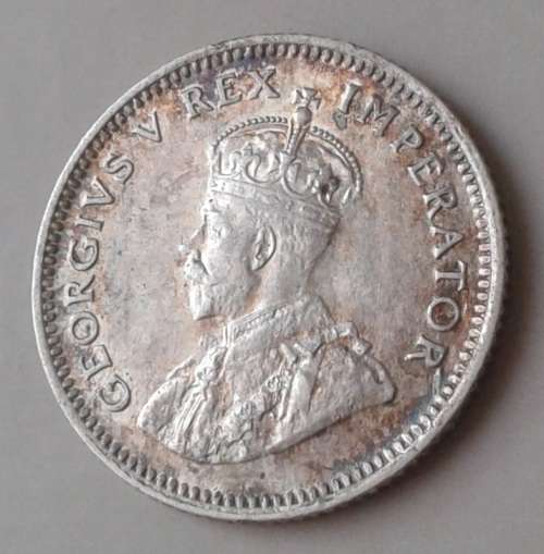 Top grade 1933 union silver sixpence in AU