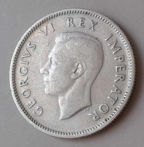 Scarcer 1945 union silver shilling in VF..