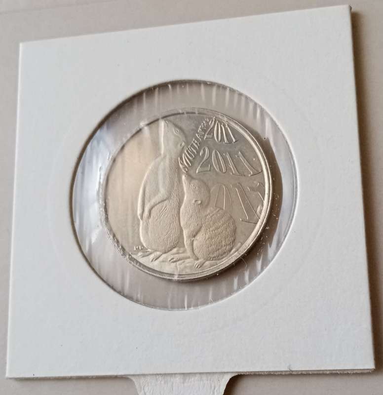 2011 Coin World token (Meerkats)