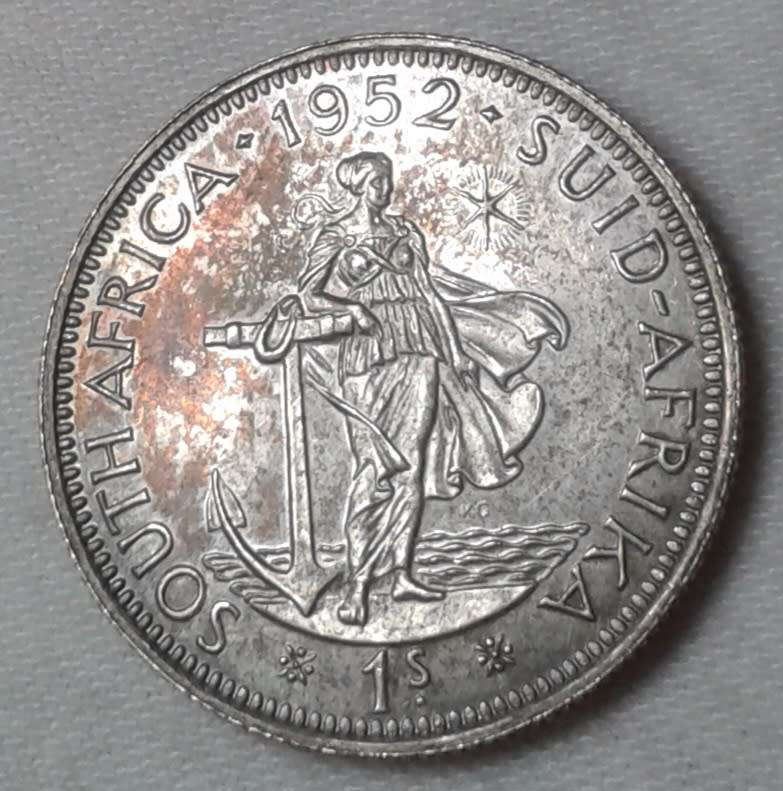 Nice 1952 union proof silver shilling with iridescent toning
