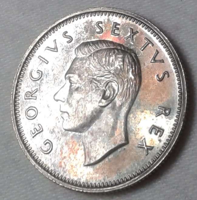 Nice 1952 union proof silver shilling with iridescent toning