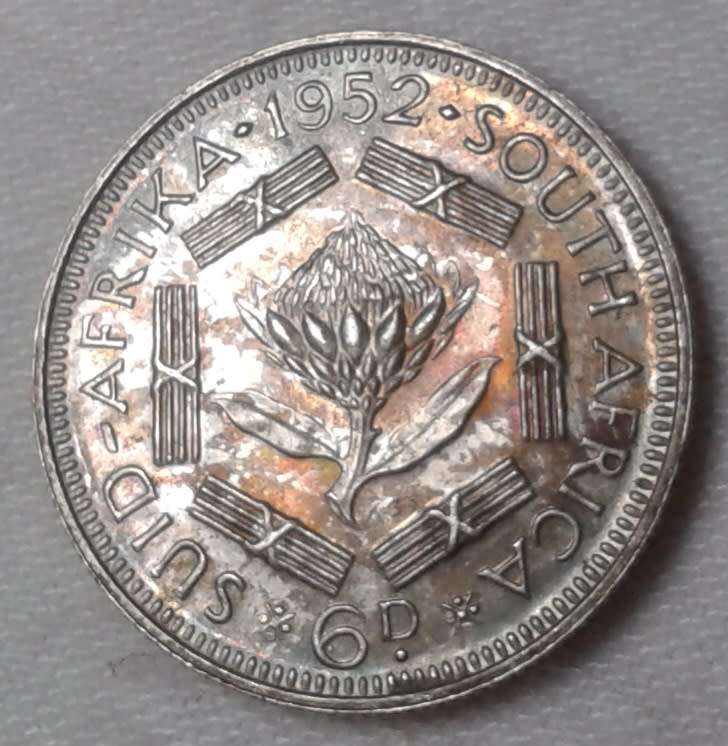 Nice 1952 union proof silver sixpence with iridescent toning