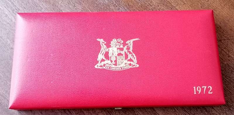 Partial 1972 proof set in red box (50c-1/2c)