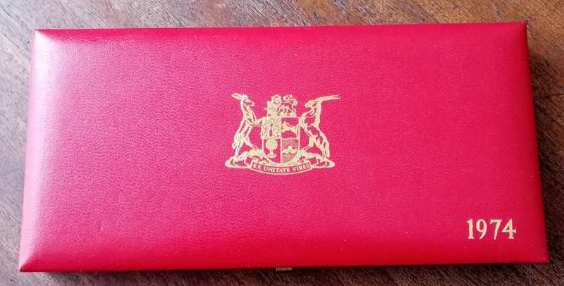 Partial 1974 proof set in red box (50c-1/2c)