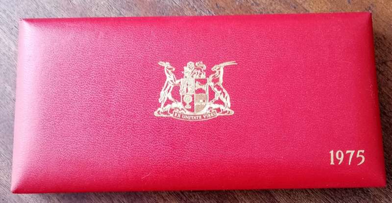 Partial 1975 proof set in red box (50c-1/2c)