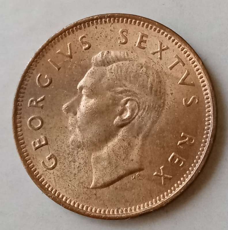1948 Union 1/4 Penny in brilliant uncirculated condition.