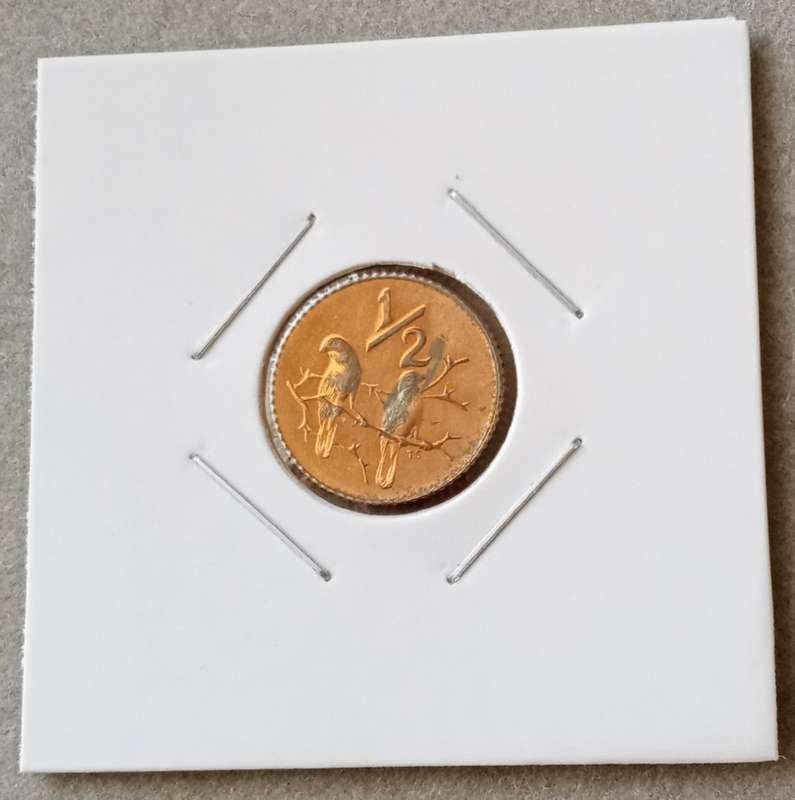 Scarcer 1980 proof 1/2c (mintage: 15000)
