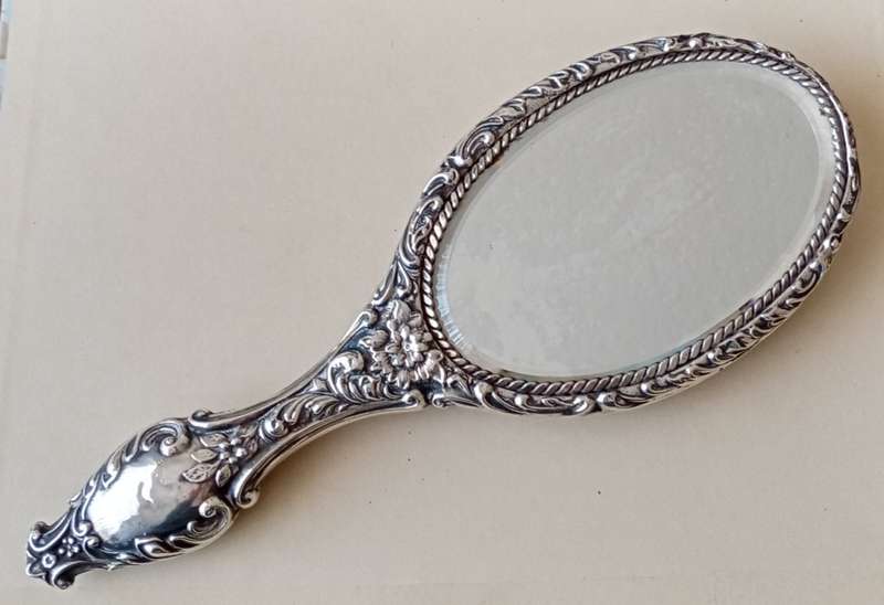 1902 Victorian hallmarked silver handheld mirror with floral design