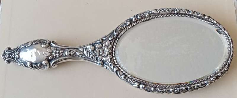 1902 Victorian hallmarked silver handheld mirror with floral design