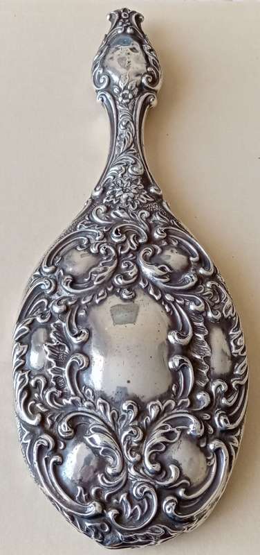1902 Victorian hallmarked silver handheld mirror with floral design