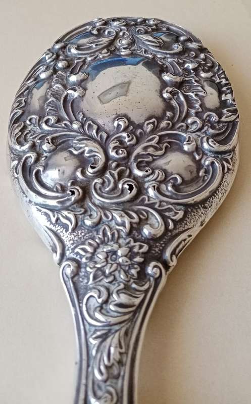 1902 Victorian hallmarked silver handheld mirror with floral design