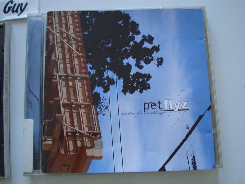 2 x Pet Flyz Cd`s - Motive for Breathing + Lucky Guy Demo